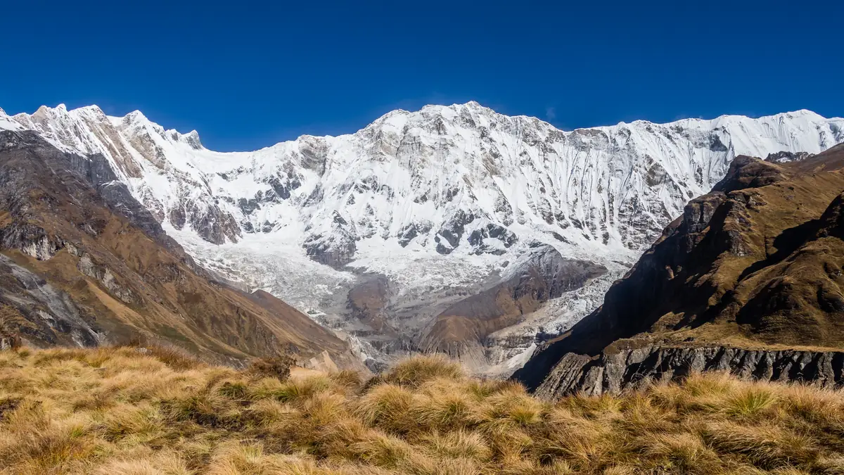 The lodges of Annapurna Base Camp before the south face of Annapurna I