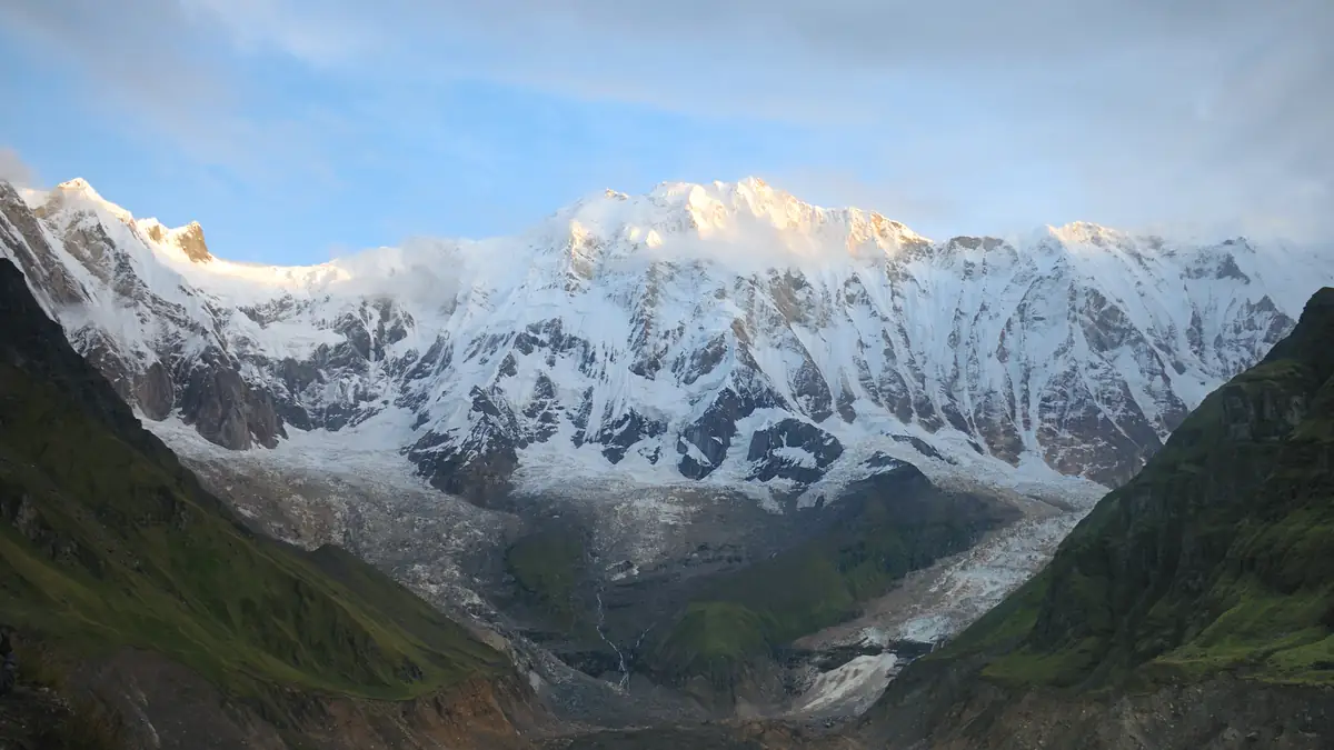 The south face of Annapurna I from base camp, the moraine in the foreground
