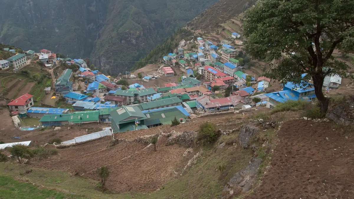Namche Bazaar in its amphitheatre with terraced fields