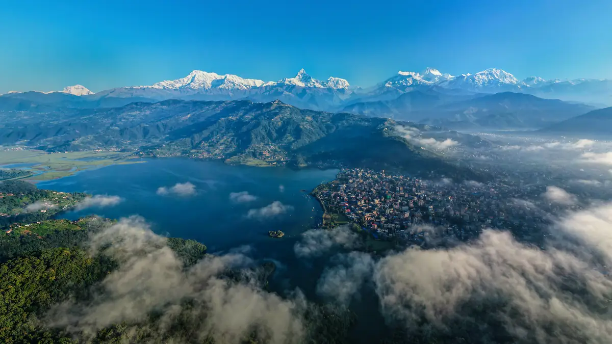 Pokhara and Phewa Lake below the Annapurna range in the morning