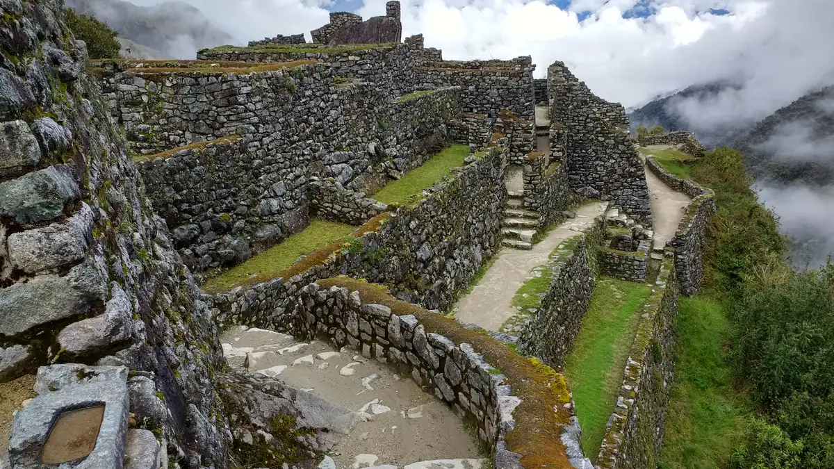The ruins of Sayacmarca in the mist on the Inca Trail