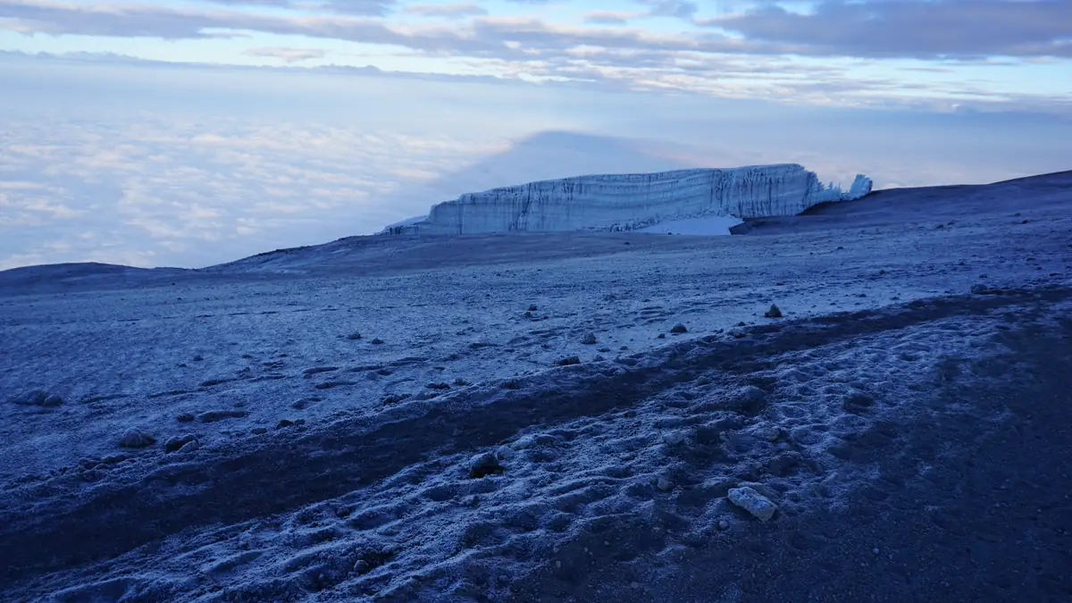 Glacier remnants on the crater rim of Kilimanjaro in the light of sunrise